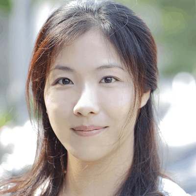 headshot of a woman with brunette hair